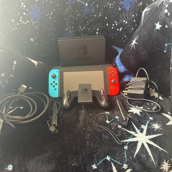Nintendo Switch with Red and Blue Joy-Cons and Accessories
